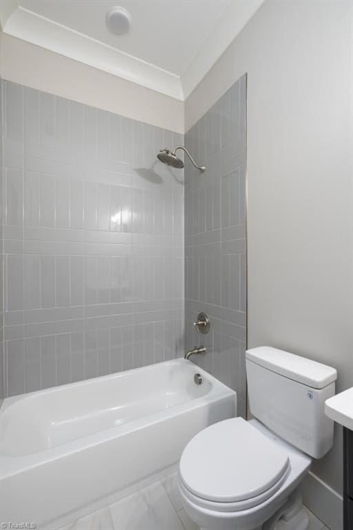 full bath with shower / bathing tub combination, toilet, marble finish floor, and vanity