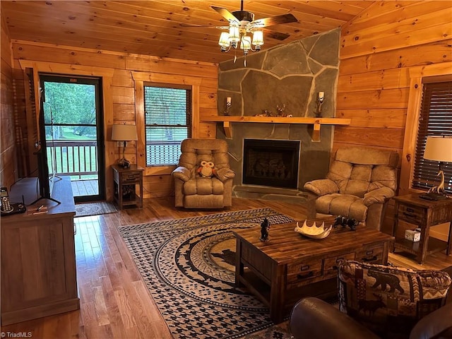 45 Wedgewood Ridge Ln, Fancy Gap, VA 24328 - living area featuring vaulted ceiling, hardwood / wood-style flooring, a ceiling fan, wooden ceiling, and wooden walls