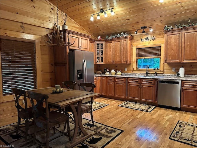 45 Wedgewood Ridge Ln, Fancy Gap, VA 24328 - kitchen featuring appliances with stainless steel finishes, lofted ceiling, light wood finished floors, wooden ceiling, and brown cabinetry