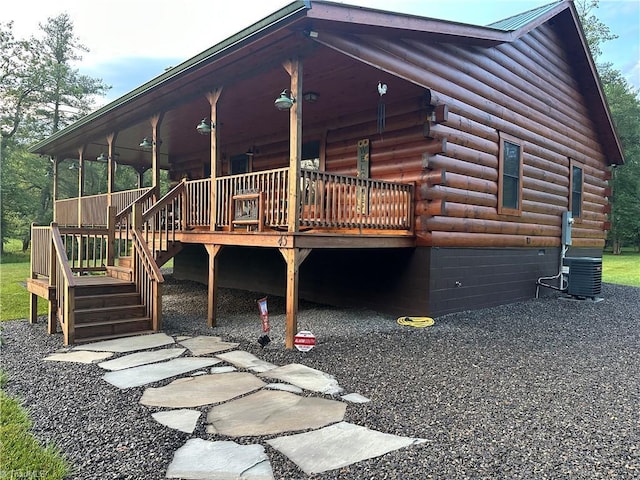 45 Wedgewood Ridge Ln, Fancy Gap, VA 24328 - back of house with log siding, stairway, and cooling unit