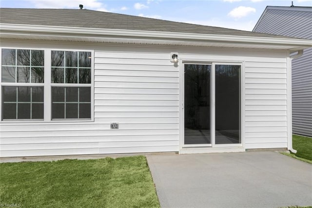 exterior space featuring a patio area and a yard