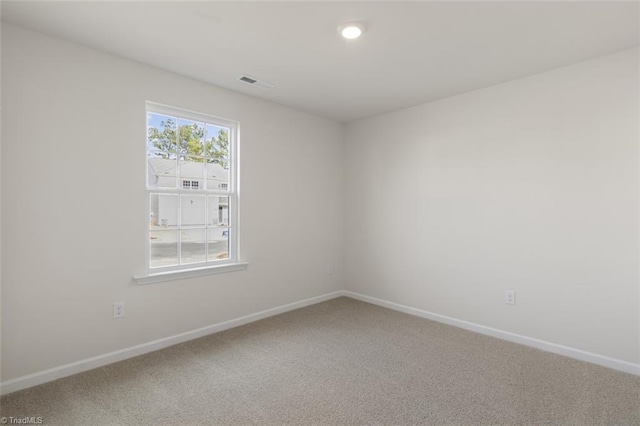 view of carpeted spare room