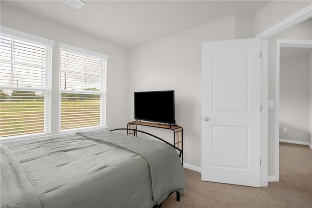 1230 Evelynnview Ln, Kernersville, NC 27284 - carpeted bedroom featuring baseboards and vaulted ceiling