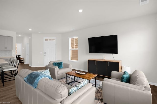 1230 Evelynnview Ln, Kernersville, NC 27284 - living room featuring baseboards, wood finished floors, and recessed lighting