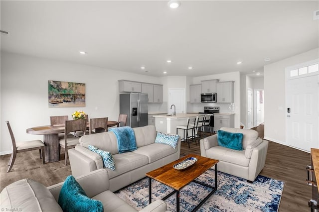 1230 Evelynnview Ln, Kernersville, NC 27284 - living room with recessed lighting, baseboards, and wood finished floors