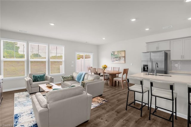 1230 Evelynnview Ln, Kernersville, NC 27284 - living area with dark wood-type flooring, recessed lighting, and baseboards