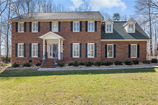 1400 Covered Wagon Rd, Mcleansville, NC 27301 - view of front of property with a front lawn and brick siding