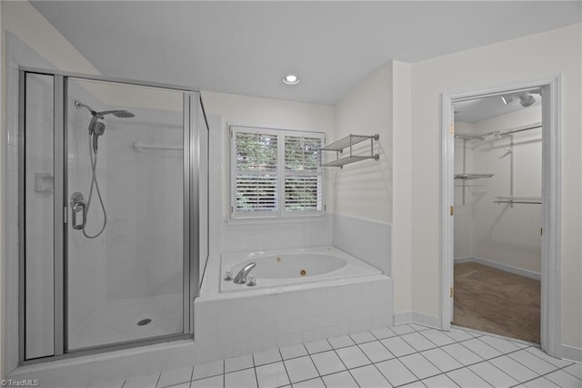 1400 Covered Wagon Rd, Mcleansville, NC 27301 - bathroom with a shower stall, tile patterned floors, a tub with jets, and a spacious closet