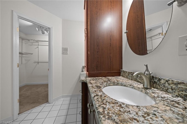 1400 Covered Wagon Rd, Mcleansville, NC 27301 - bathroom featuring tile patterned floors, vanity, and baseboards