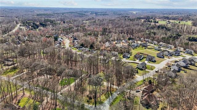 1400 Covered Wagon Rd, Mcleansville, NC 27301 - aerial view of property and surrounding area featuring nearby suburban area and a forest