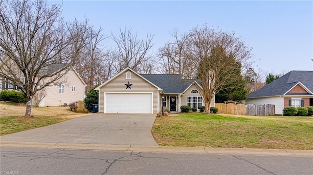 ranch-style home with concrete driveway, fence, a garage, and a front yard