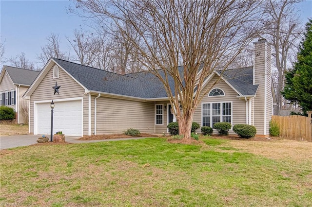 ranch-style home with an attached garage, driveway, a front lawn, and fence