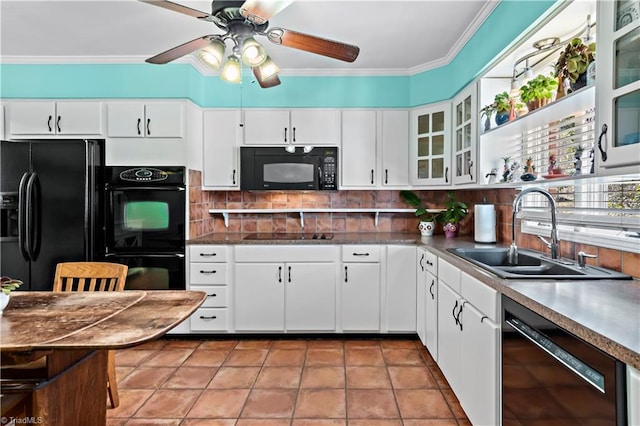 kitchen with backsplash, black appliances, white cabinets, sink, and tile patterned flooring