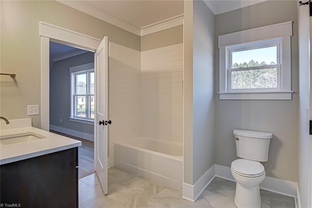 full bath with toilet, baseboards, ornamental molding, and a sink