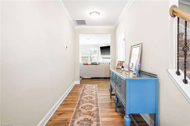 2177 Campbell Loop, Burlington, NC 27215 - hall with ornamental molding, light wood-type flooring, and baseboards