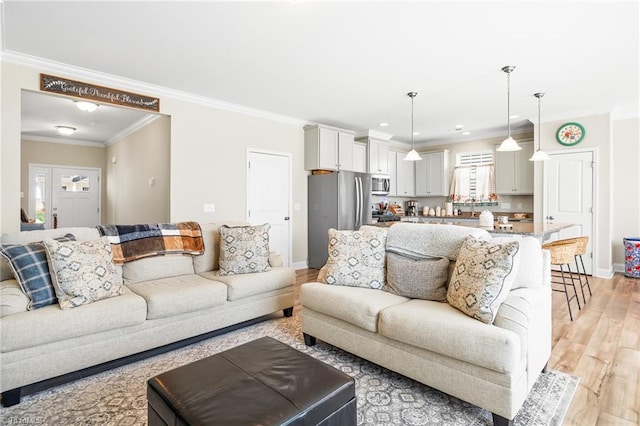 2177 Campbell Loop, Burlington, NC 27215 - living room featuring ornamental molding, baseboards, light wood-style flooring, and recessed lighting