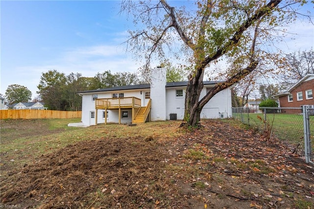 rear view of house with a deck