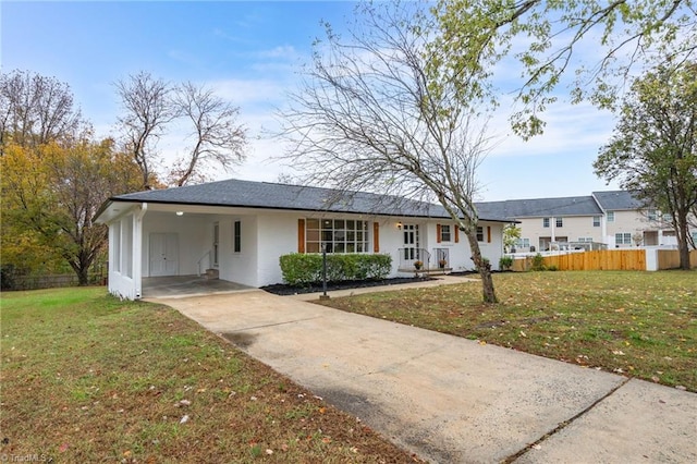 ranch-style house with a front lawn and a carport