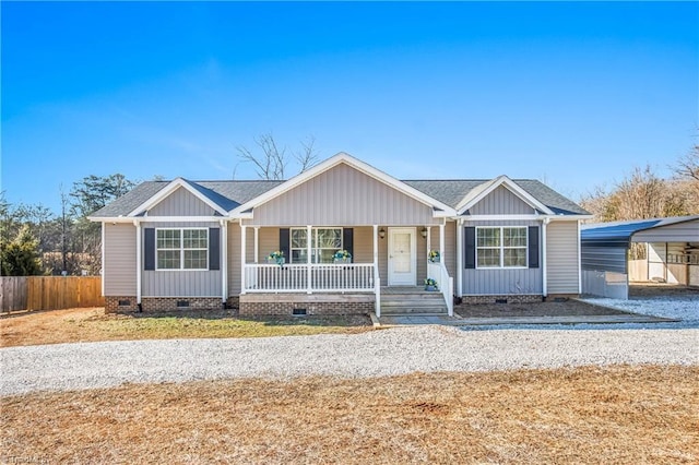 ranch-style home with a carport and a porch