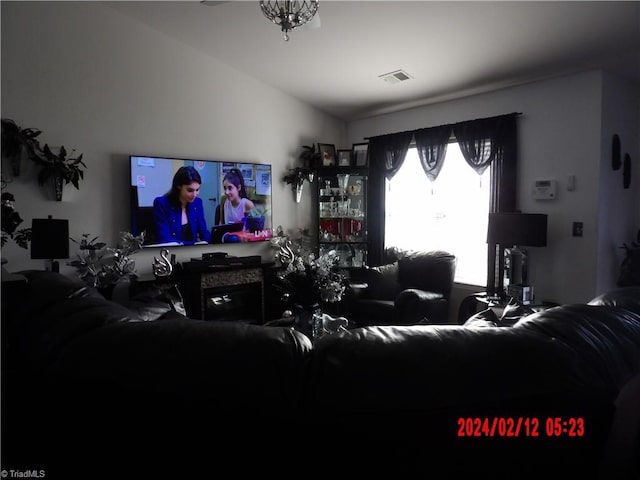 living room with vaulted ceiling