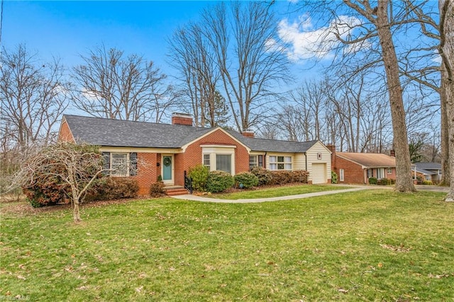 ranch-style home with a garage and a front yard