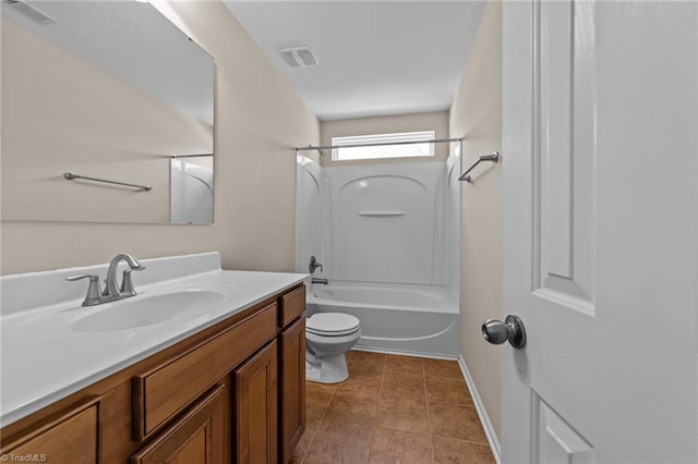 bathroom featuring toilet, vanity, shower / bathing tub combination, and visible vents