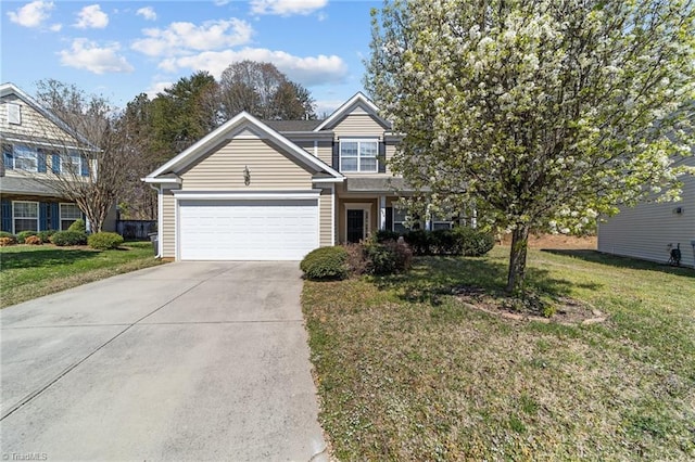 view of front of property with a front lawn, an attached garage, and concrete driveway