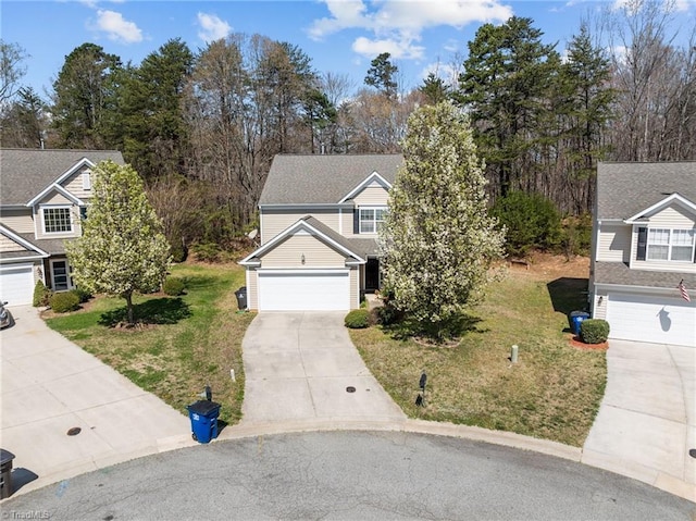 view of front of house with driveway and a front yard