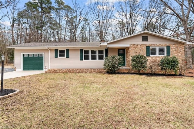 ranch-style house with a garage and a front lawn