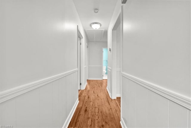 hall with light wood-type flooring