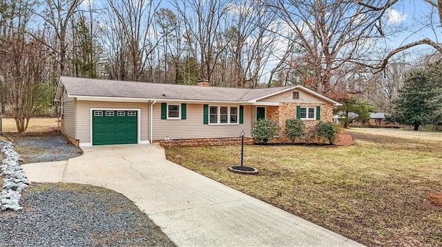 single story home featuring a garage and a front lawn