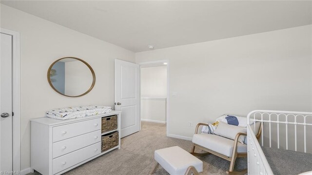 123 Lisa Ln, Winston-Salem, NC 27107 - bedroom with baseboards and light colored carpet