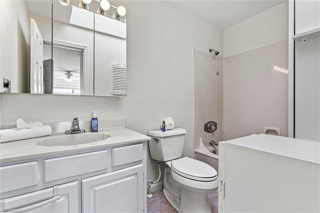 bathroom featuring vanity, toilet, a ceiling fan, and shower / bathtub combination