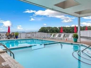 pool with a patio