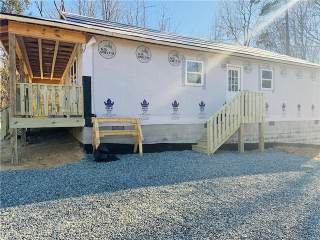 exterior space with crawl space