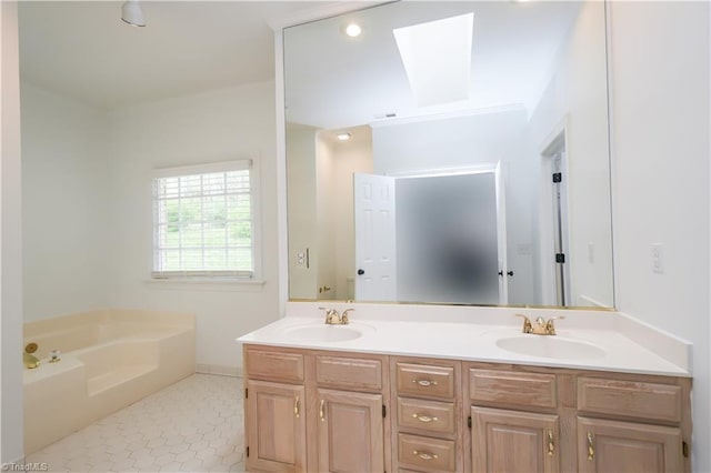 143 Wellesborough Rd, Winston-Salem, NC 27104 - bathroom with a sink, double vanity, and a garden tub