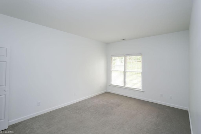 143 Wellesborough Rd, Winston-Salem, NC 27104 - carpeted empty room with baseboards