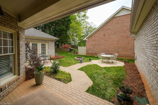 143 Wellesborough Rd, Winston-Salem, NC 27104 - view of yard with a patio area, fence, and an outdoor fire pit