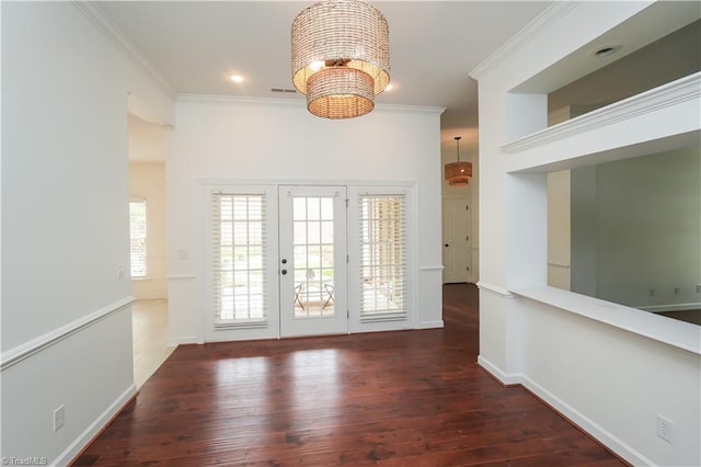 143 Wellesborough Rd, Winston-Salem, NC 27104 - interior space featuring visible vents, baseboards, a notable chandelier, hardwood / wood-style flooring, and crown molding