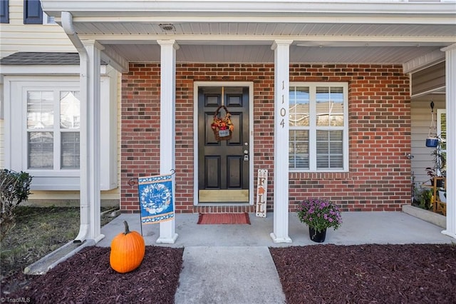 property entrance with a porch