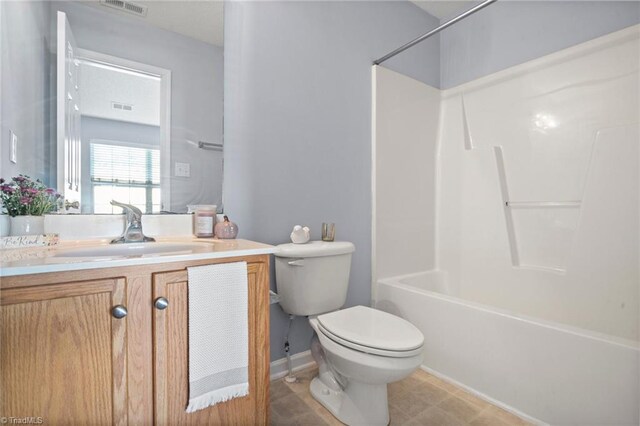 full bathroom with toilet, vanity, and bathing tub / shower combination