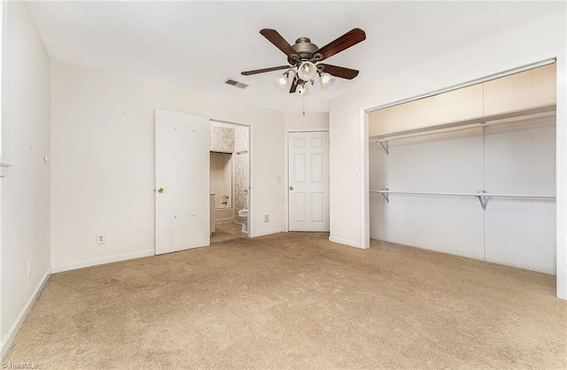 214 Whispering Creek Rd, King, NC 27021 - unfurnished bedroom with carpet, ensuite bathroom, ceiling fan, and a closet