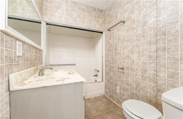 214 Whispering Creek Rd, King, NC 27021 - full bath with tile walls, vanity,  shower combination, and tile patterned floors