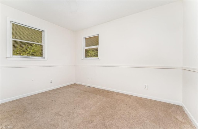 214 Whispering Creek Rd, King, NC 27021 - carpeted empty room with baseboards
