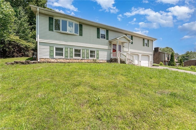 214 Whispering Creek Rd, King, NC 27021 - split foyer home featuring a garage, a front yard, and concrete driveway