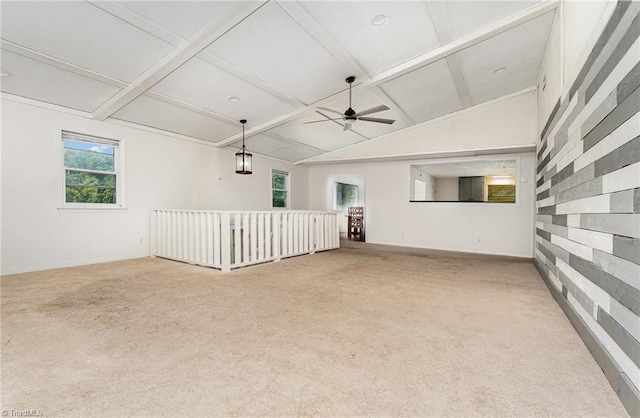 214 Whispering Creek Rd, King, NC 27021 - empty room featuring light colored carpet, a ceiling fan, beamed ceiling, and high vaulted ceiling