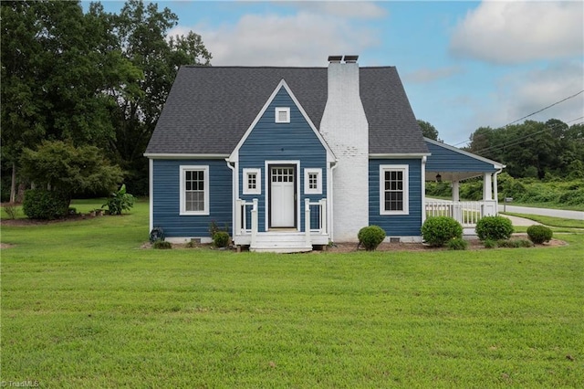 view of front of house with covered porch and a front yard