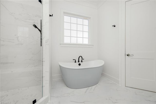 bathroom featuring shower with separate bathtub