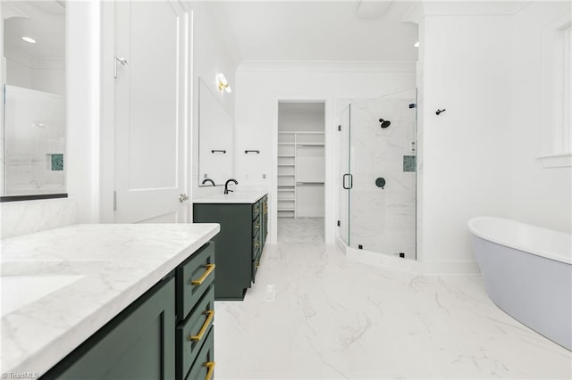 bathroom featuring vanity, ornamental molding, and shower with separate bathtub