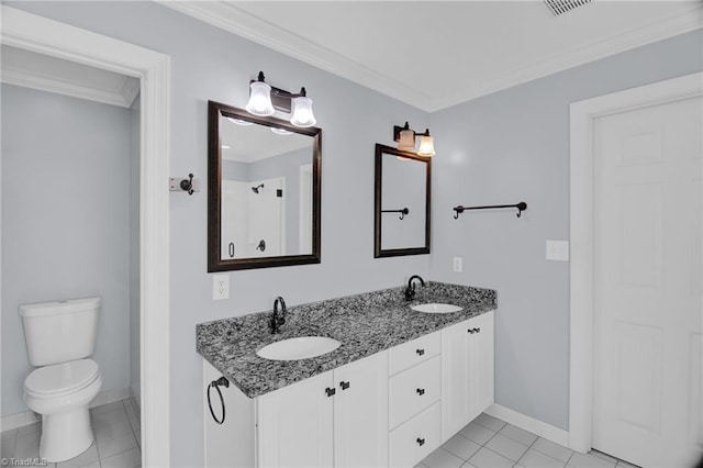 bathroom featuring tile patterned flooring, ornamental molding, toilet, baseboards, and double vanity